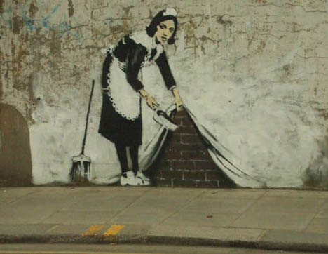 guerrilla-art-banksy-maid-sweep.jpg
