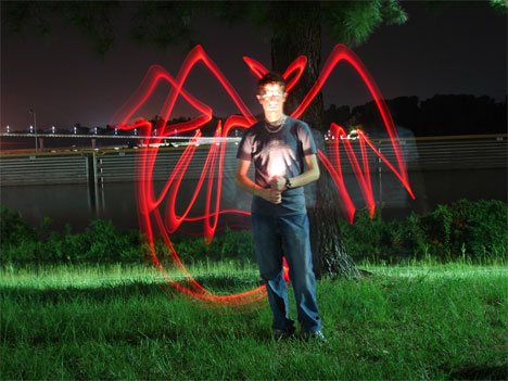time lapse photography light graffiti devil