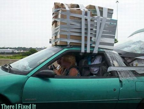 box duct taped to roof of car
