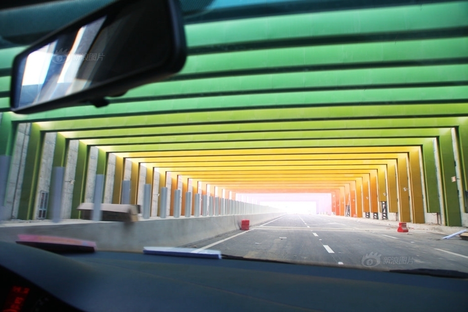 Prism Break: China’s Eye-Soothing Rainbow Road Tunnel | Urbanist