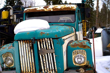 abandoned truck in snow