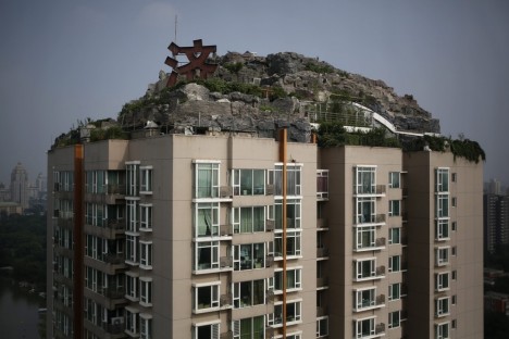 Image: A villa built privately on the rooftop of a 26-storey residential block in Beijing.