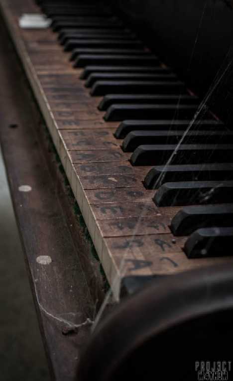 abandoned piano OM Asylum