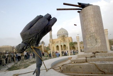 smashed statue Saddam Hussein Baghdad 2003