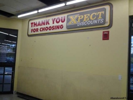 abandoned closed XPect Discounts store 1c