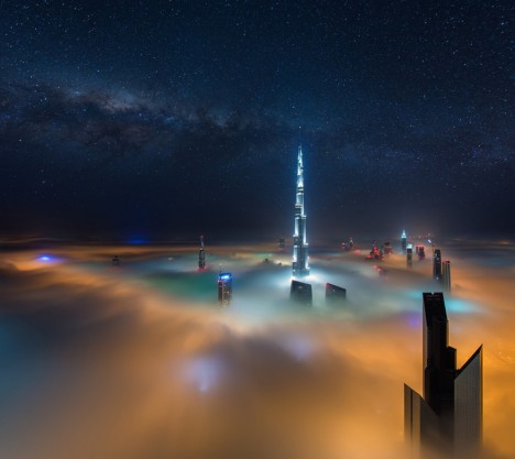 dubai skyscrapers above fog